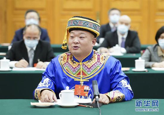  5月24日，全國人大代表宋慶禮參加湖北代表團的審議并發(fā)言。新華社記者 黃敬文 攝